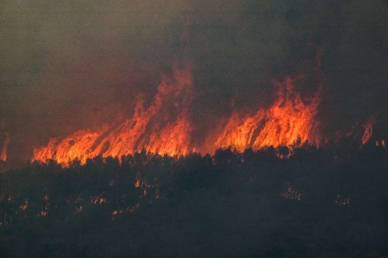 Rising temperatures have complicated efforts to contain the fires outside Athens