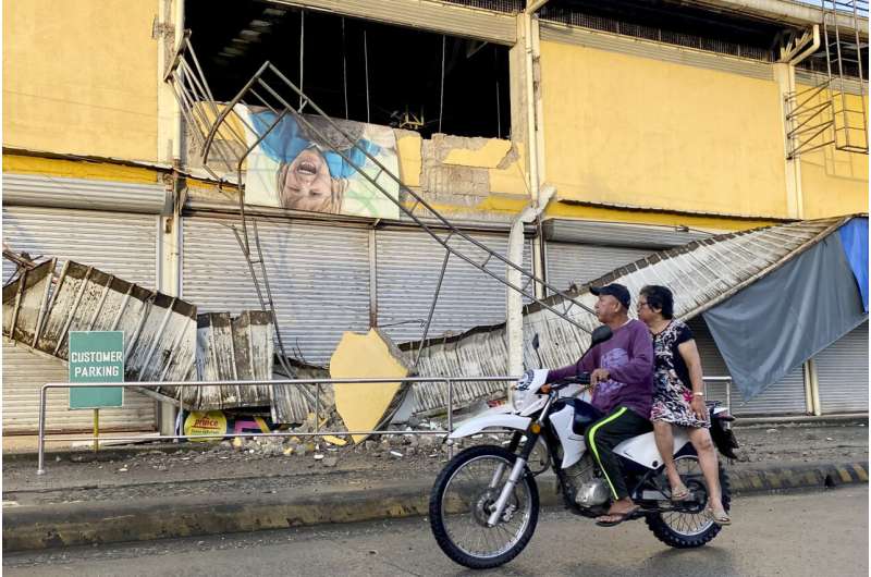 Strong earthquake that sparked a tsunami warning leaves 1 dead amid widespread panic in Philippines