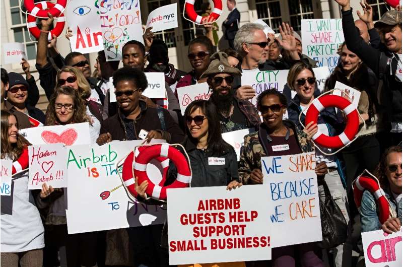 Supporters of Airbnb gather in front of New York City Hall on October 30, 2023, to protest the new legal hurdles for short-term 