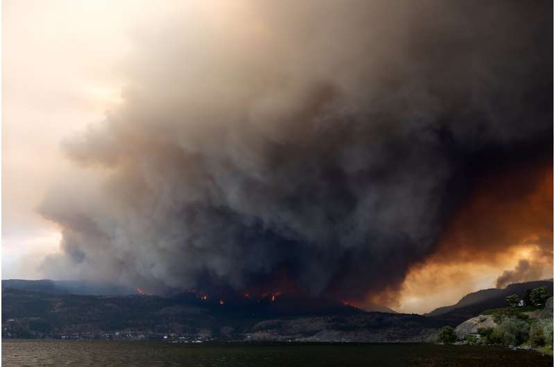 The McDougall Creek wildfire burns in the hills of West Kelowna. Evacuation orders were put in place in the area of Kelowna, wit