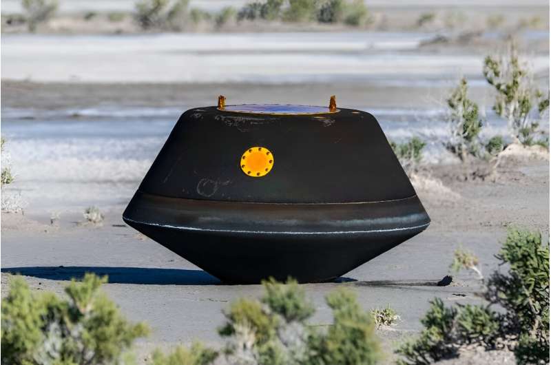 The Osiris-Rex mission's capsule is seen shortly after touching down in the desert on September 24, 2023 at the Utah Test and Training Range
