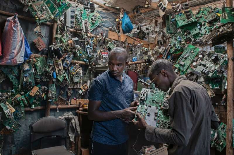 The pair scour dumping grounds around the Kenyan capital in search of discarded gadgets which they repurpose