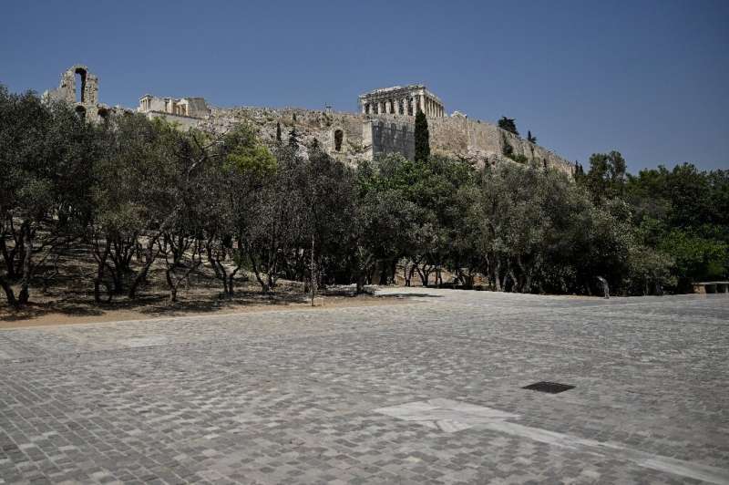 The pedestrian zone near the Acropolis in Athens is empty of tourists and residents as Greece faces its hottest July weekend in 