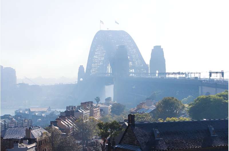 The Sydney Harbour Bridge is seen shrouded by smoke on September 13, 2023