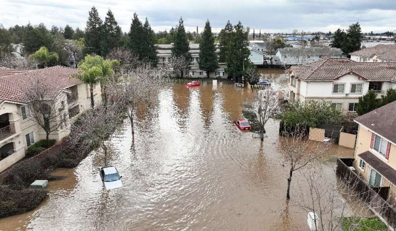 This aerial view shows a flooded neighborhood in Merced, California on January 10, 2023