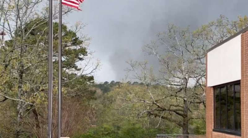 This framegrab from a video provided by Lane Hancock on March 31, 2023 shows a tornado brewing in Little Rock, Arkansas