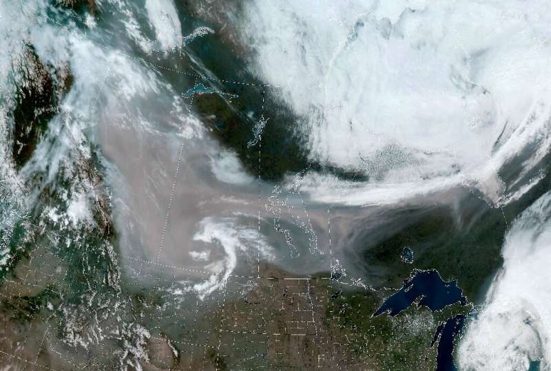 This image obtained from the National Oceanic and Atmospheric Administration shows smoke from wildfires in Canada's western Albe