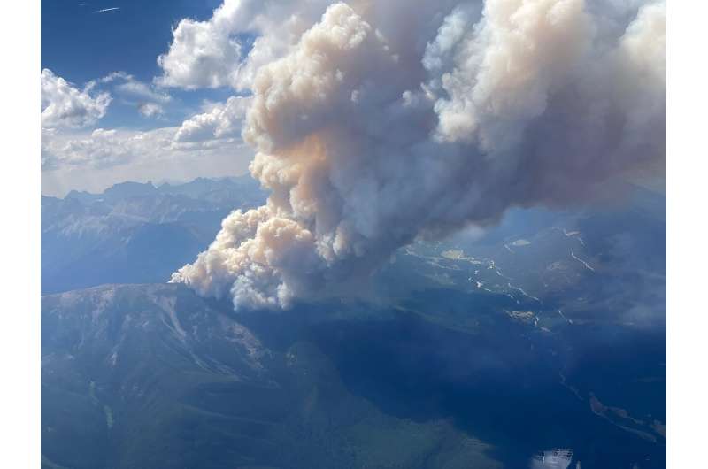 This July 24, 2023, handout image from the British Columbia Wildfire Service shows an aerial view of the Horsethief Creek wildfi