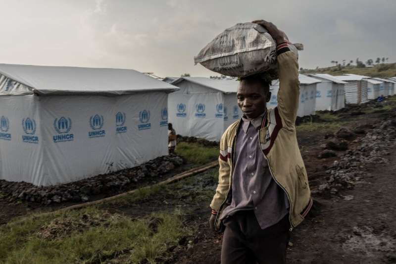 Thousands of people are living in the Bushagara refugee camp, north of Goma