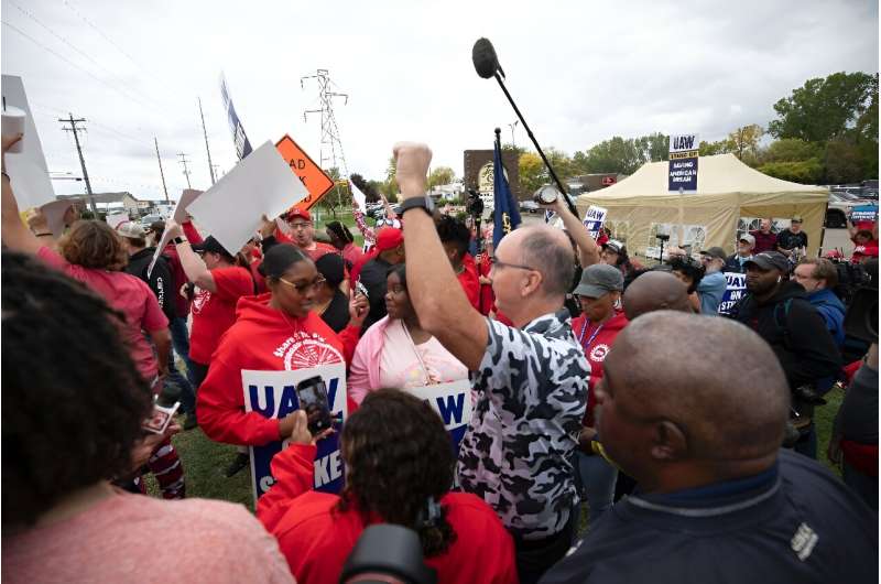 UAW President Shawn Fain joining workers on the picket line late last month in Lansing, Michigan
