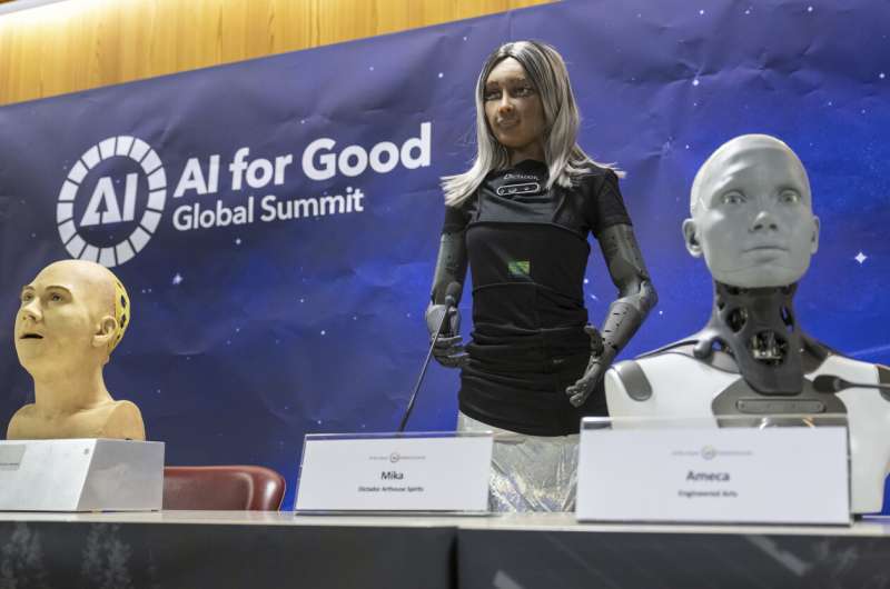 UN tech agency rolls out human-looking robots for questions at a Geneva news conference
