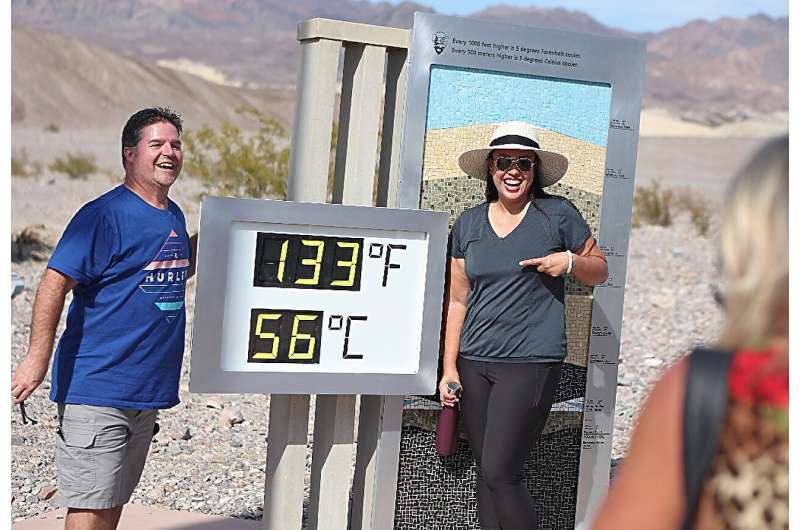 Visitors at California's famous Death Valley, one of the hottest places on Earth, on July 16