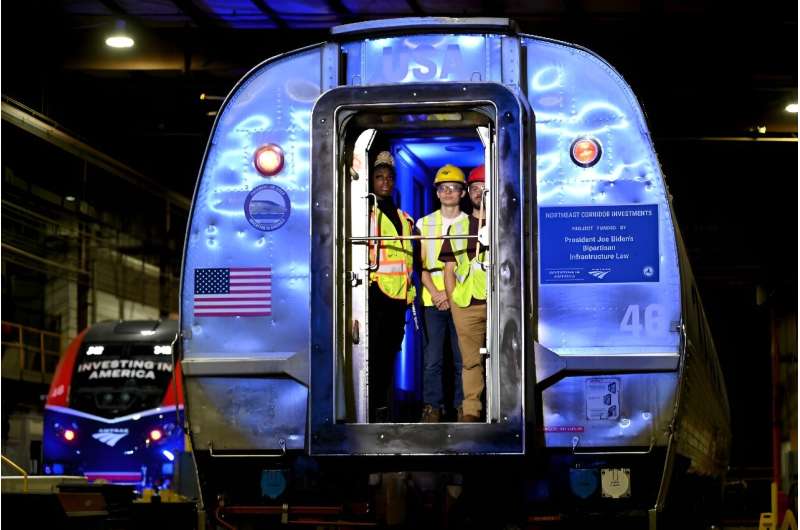 Workers are seen at an Amtrak facility in New Castle County, Delaware in November 2023