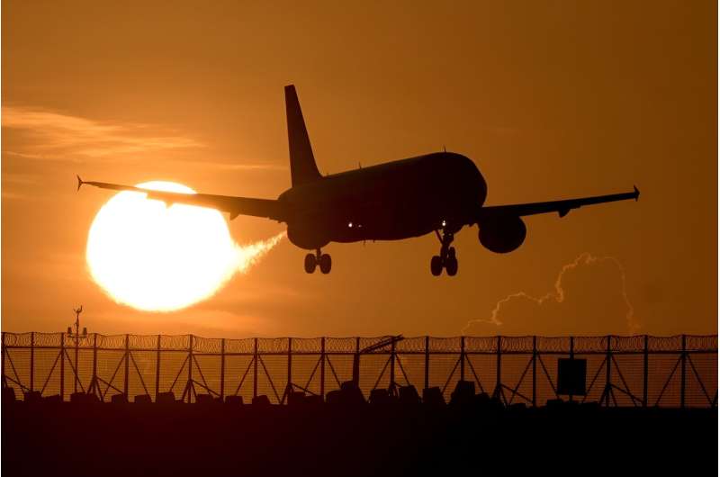 A commercial plane prepares to land at Ngurah Rai international airport in Denpasar, on Indonesia's Bali island