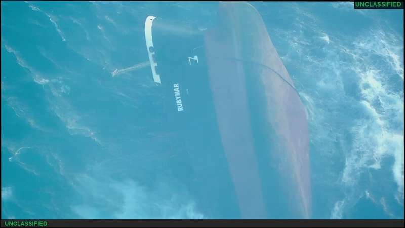 A handout picture released by the US Central Command shows the capsized Rubymar in the Red Sea, after taking damage due to a missile strike claimed by Yemen's Huthi rebels