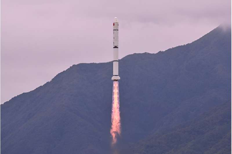 A Long March 2-C rocket carrying a satellite jointly developed by China and France to measure gamma-ray bursts lifts off from a space base in Xichang in China’s southwest
