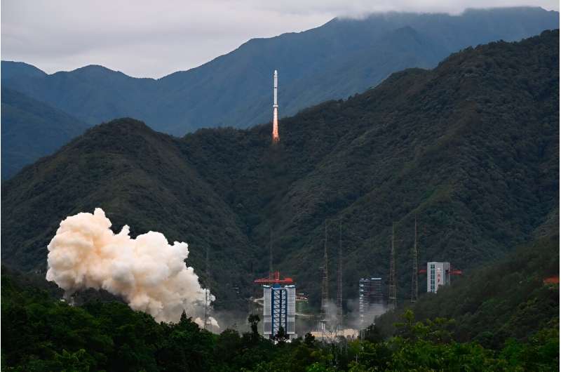 A Long March 2-C rocket carrying a satellite jointly developed by China and France to measure gamma-ray bursts lifts off from a space base in Xichang in southwestern China