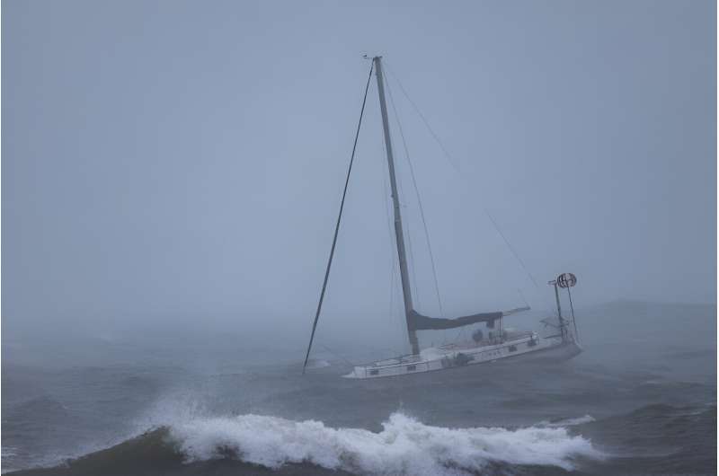 A moored boat is tossed by rough waters off Santa Barbara, California on February 4, 2024