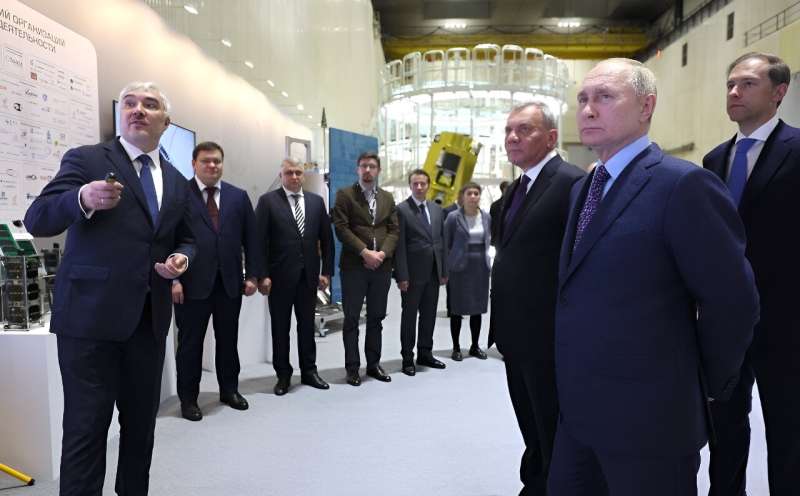 A pool photograph distributed by Russian state owned agency Sputnik shows President Vladimir Putin visiting the Rocket and Space Corporation  Energia, near Moscow, on October 26, 2023