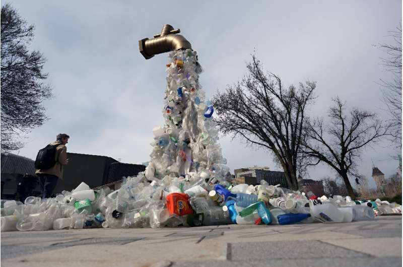 A sculpture titled &quot;Giant Plastic Tap&quot; by Canadian artist Benjamin Von Wong is displayed outside the fourth session of the UN Intergovernmental Negotiating Committee on Plastic Pollution in Ottawa, Canada, on April 23, 2024
