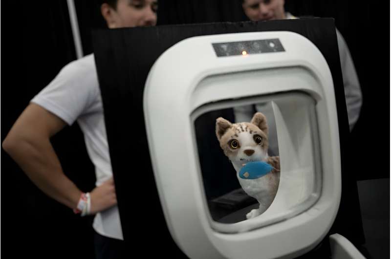 A smart pet door from Flappie Technologies is seen during CES Unveiled  in Las Vegas