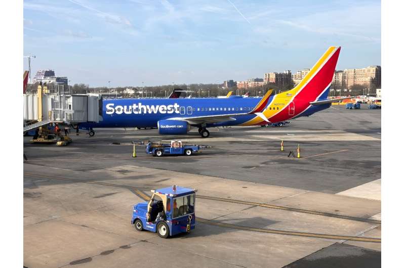 A Southwest Airlines Boeing 737 sits at a gate at Washington's Reagan National Airport (DCA) in Arlington, Virginia, on March 31, 2024