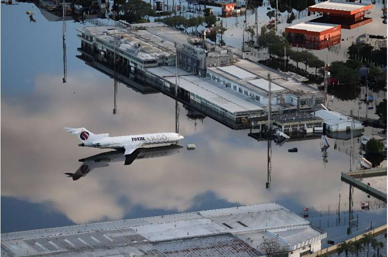 An aerial view shows the flooded tarmac of Salgado Filho International Airport in the city of Porto Alegre, Rio Grande do Sul state, Brazil, on May 20, 2024