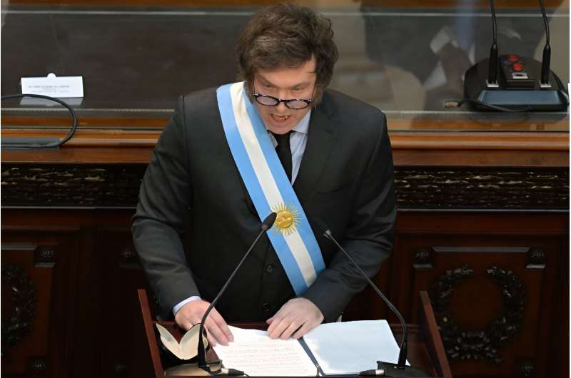 Argentina's President Javier Milei gestures while delivering his first policy speech to parliament during the inauguration of the 142nd ordinary session of Congress in Buenos Aires on March 1, 2024
