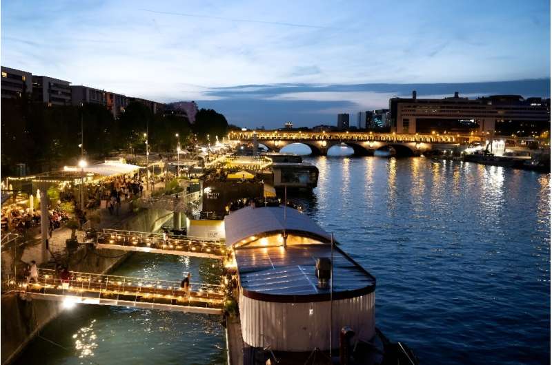 Barges that flushed directly into the Seine have been forced to connect to the Paris sewage system