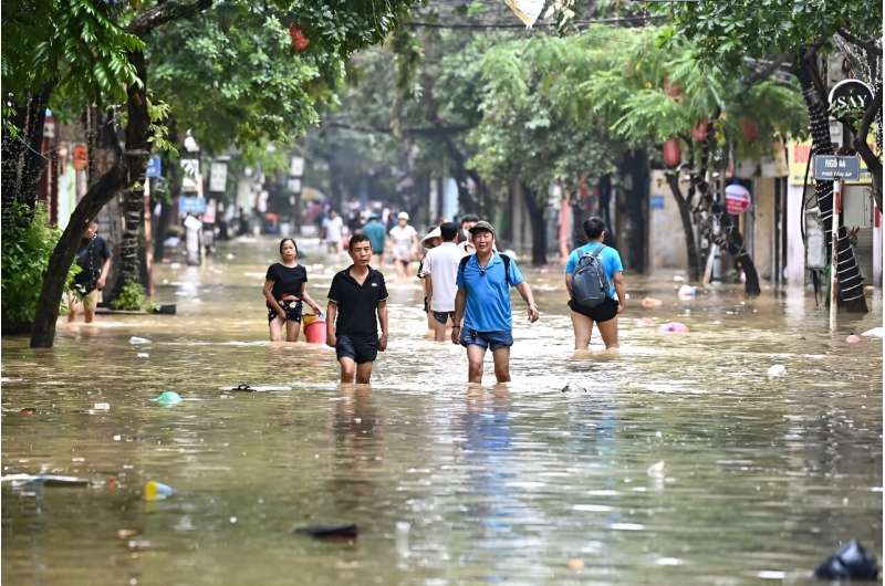 The residents of North Vietnam are not only struggling with flooding in their homes, but also with power outages.