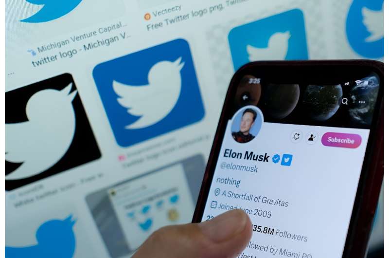 Blue ticks return, for some -- Elon Musk's blue tick next to his name on a smartphone in 2023