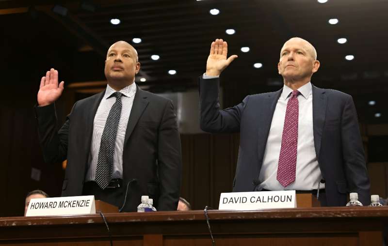 Boeing President and CEO Dave Calhoun and Boeing Chief Engineer Howard McKenzie are sworn in during a Senate Homeland Security and Governmental Affairs Committee Investigations Subcommittee hearing to examine &quot;Boeing's broken safety culture&quot; on 
