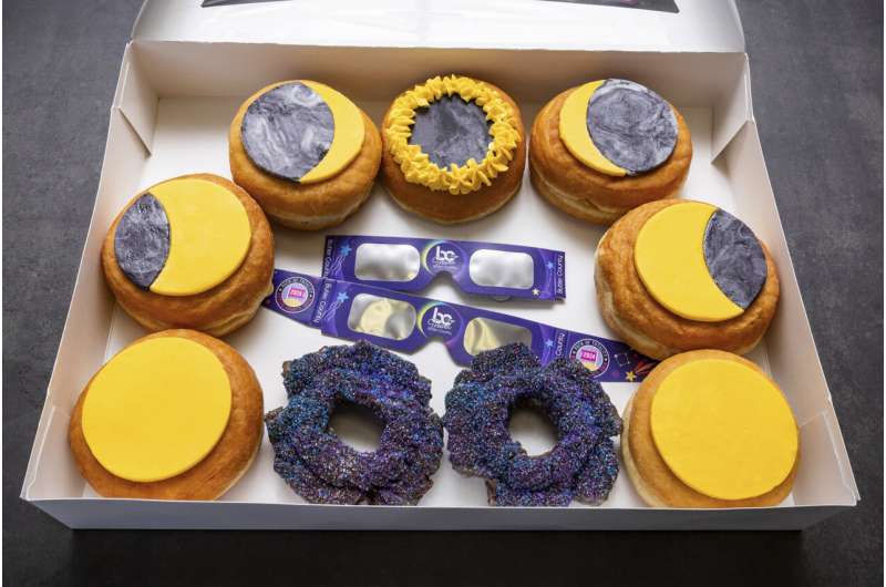 Businesses are ready for April's total solar eclipse with celestial-themed doughnuts and beer