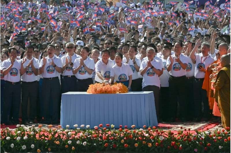 Cambodia's Prime Minister Hun Manet and his wife press a button launch  the Funan Techo Canal project