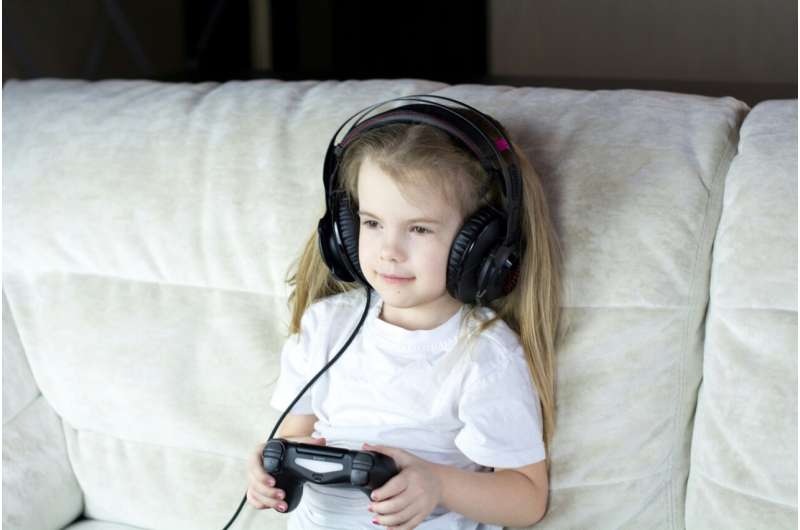 child playing computer