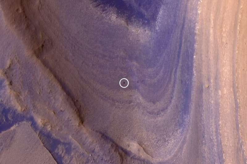 Curiosity rover is climbing through dramatic striped terrain on mars