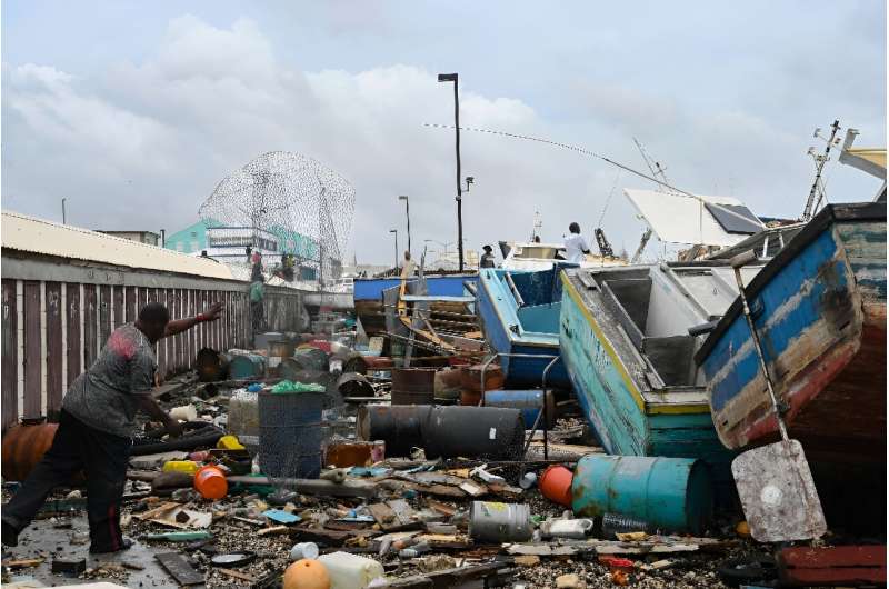Damaged fishing boats pile up against each other after Hurricane Beryl in Bridgetown, Barbados
