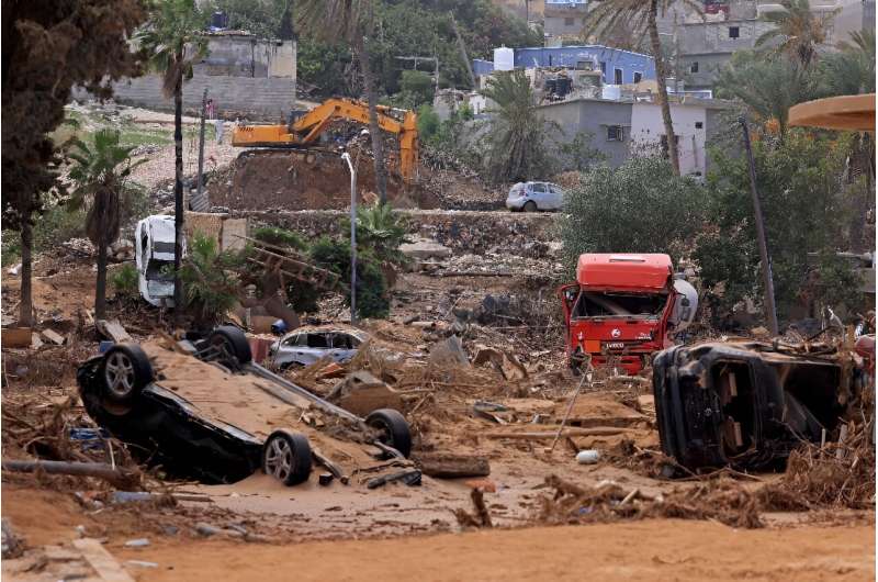 Смертоносные ливневые наводнения разрушили прибрежный город Дерна в Ливии в сентябре 2023 года.