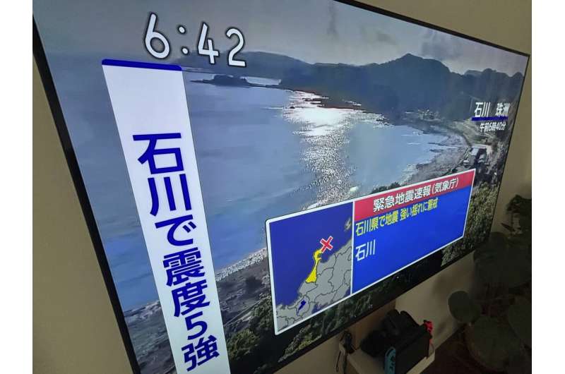 Earthquakes in north-central Japan collapse 5 homes that were damaged in deadly January quake