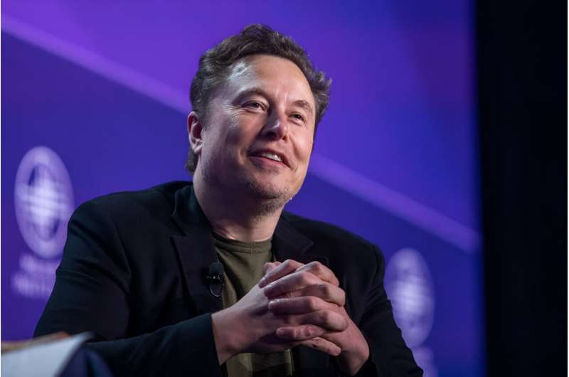 Elon Musk has threatened to ban iPhones inside his companies, saying an alliance between Apple and OpenAI has him worried about data security