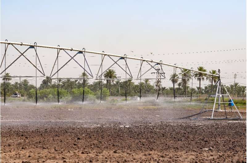 Experts say new methods using sprinklers and drip irrigation use 70 percent less water than the traditional flooding practice of Iraqi rice growers