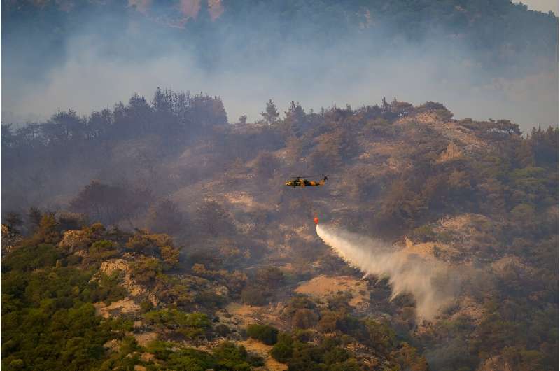 Firefighters battle severe forest fire in the Turkish Aegean city of Izmir for the third day in a row