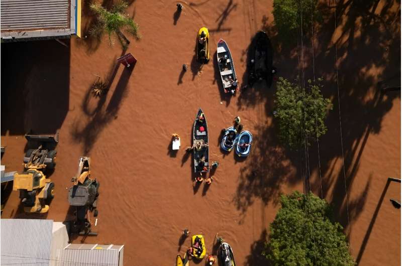 Historic levels of rainfall and flooding in southern Brazil, such as seen in this aerial view over Porto Alegre on May 6, 2024, have fueled a spate of conspiracy theories