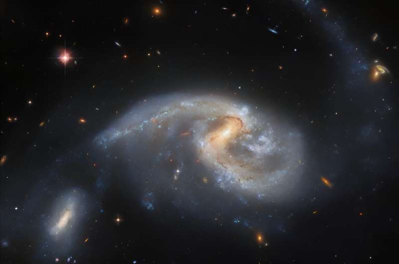 Hubble peers at pair of closely interacting galaxies