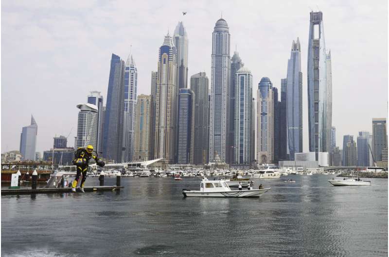 ‘Iron Man’ pilots race in jet suits against a backdrop of Dubai skyscrapers