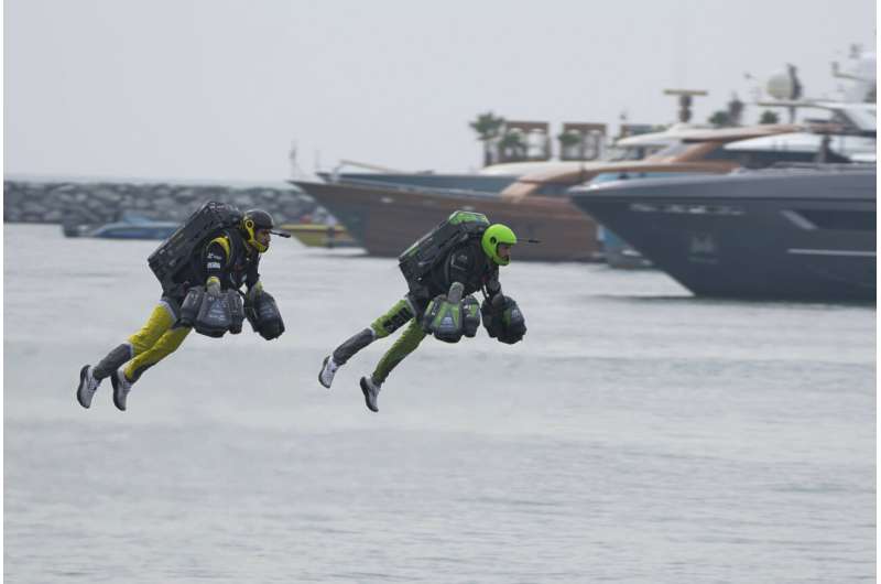 ‘Iron Man’ pilots race in jet suits against a backdrop of Dubai skyscrapers