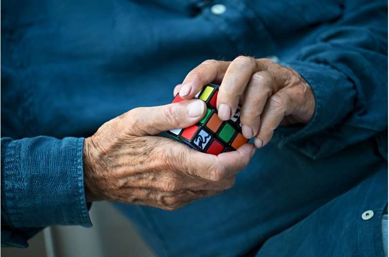 It's what hands are for: Inventor Erno Rubik gets to grip with his famous cube