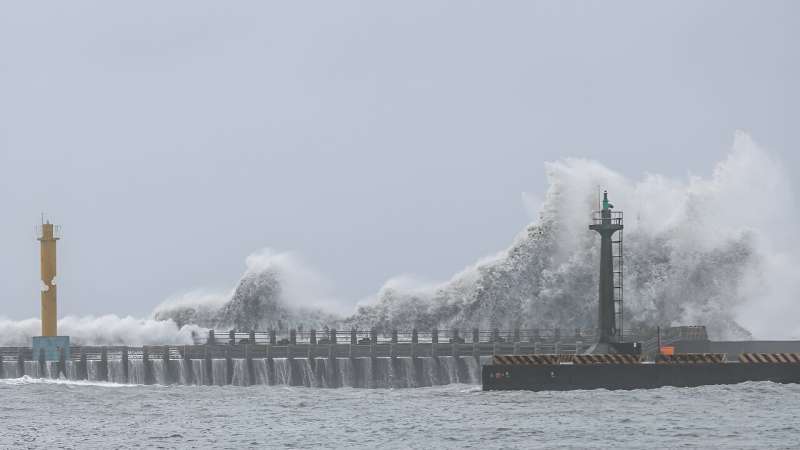 Massive waves crashed against the coast of northeastern Yilan county
