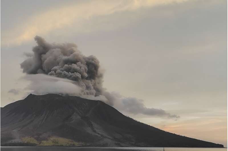 Mount Ruang erupted again after nearly half a dozen earlier in the week stirred a spectacular mix of fiery orange lava, a towering ash column and volcanic lightning