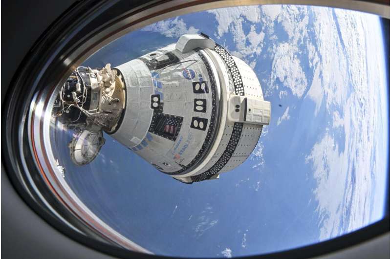 NASA decides to keep 2 astronauts in space until February, nixes return on troubled Boeing capsule